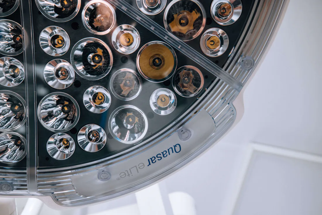 The operating lights above the theatre table.