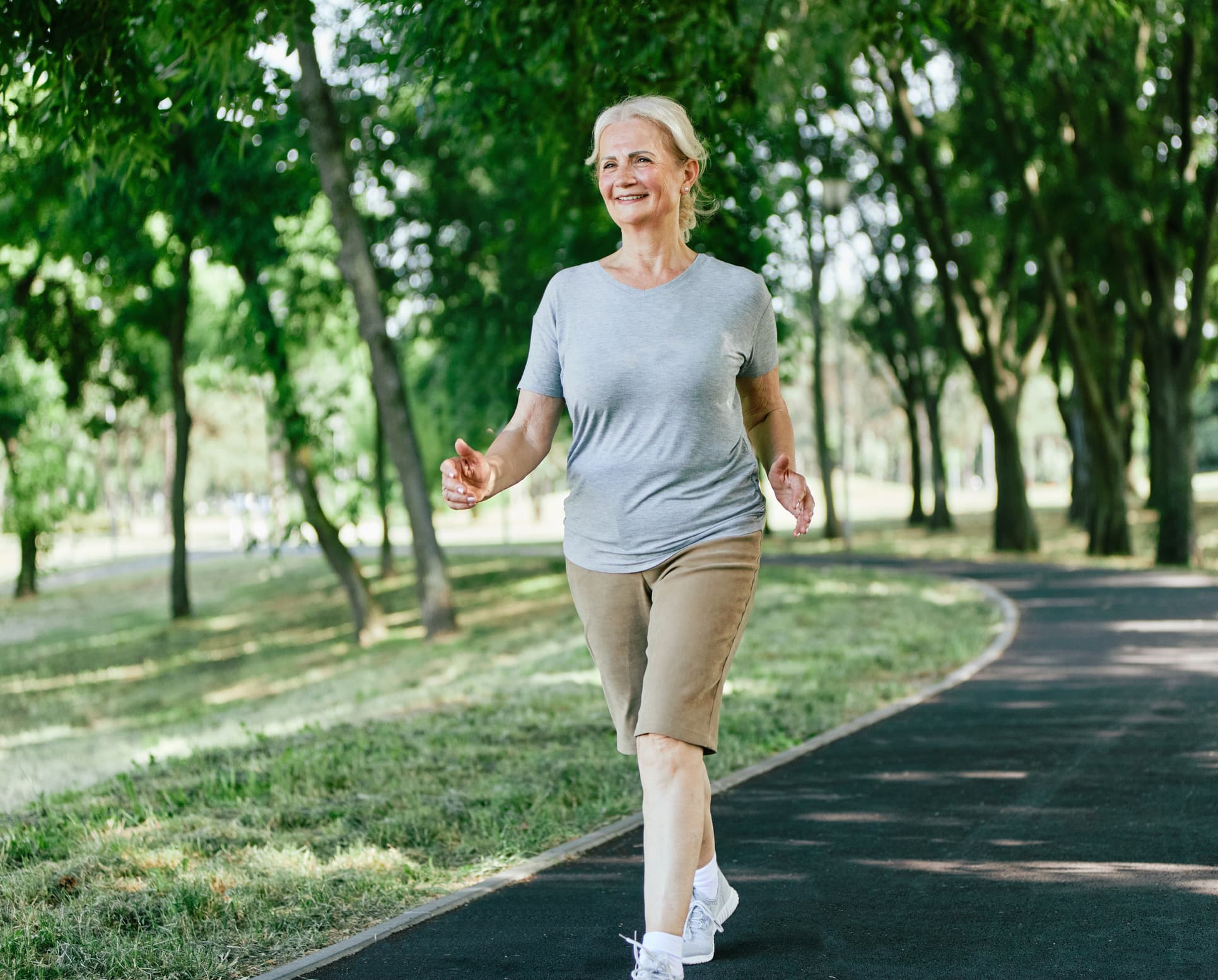 Person walking outdoors as a practical distraction technique while quitting smoking
